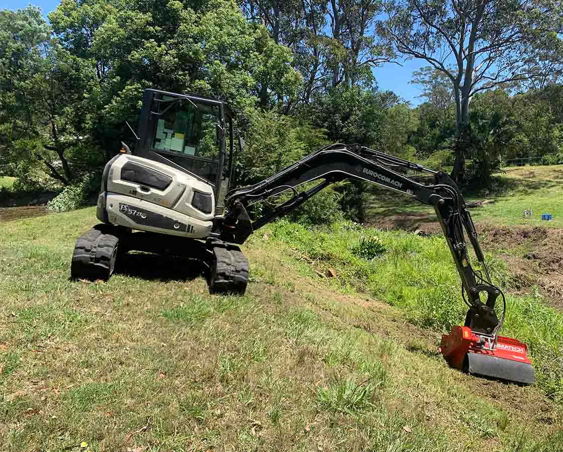 Excavator Machine Clearing the Site — Tree Removal & Land Clearing In Central Coast, NSW